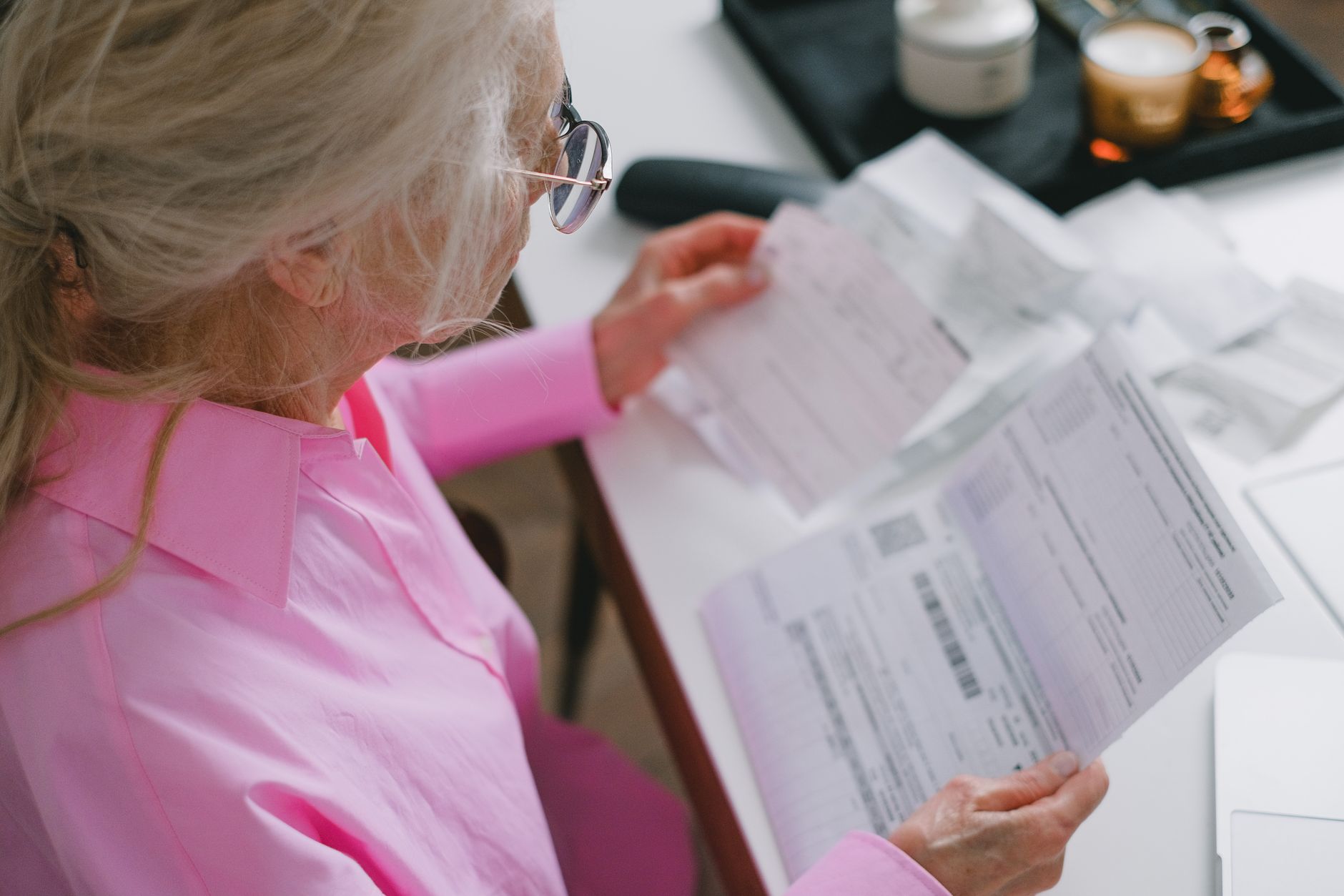 Business owner reviewing energy bills