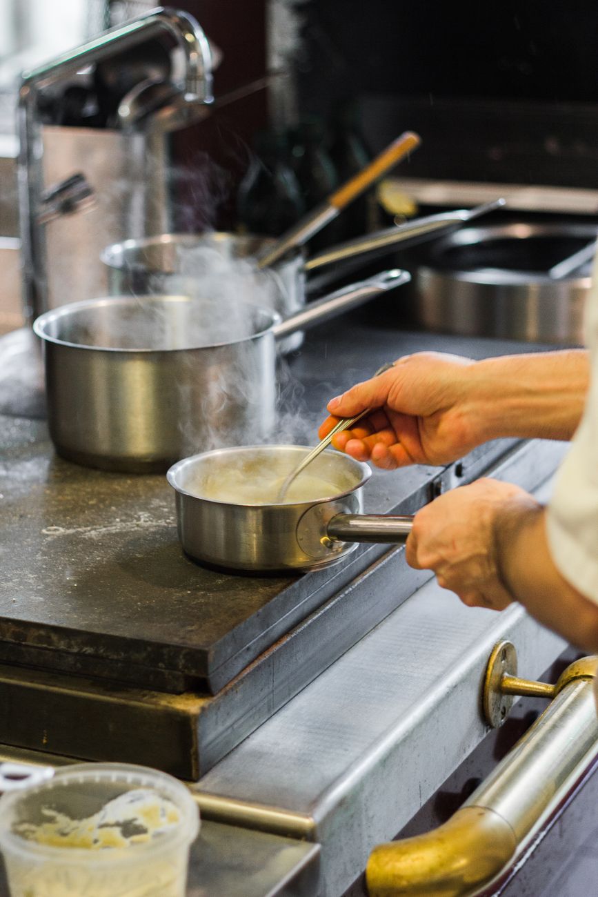 Professional restaurant kitchen chef cooking